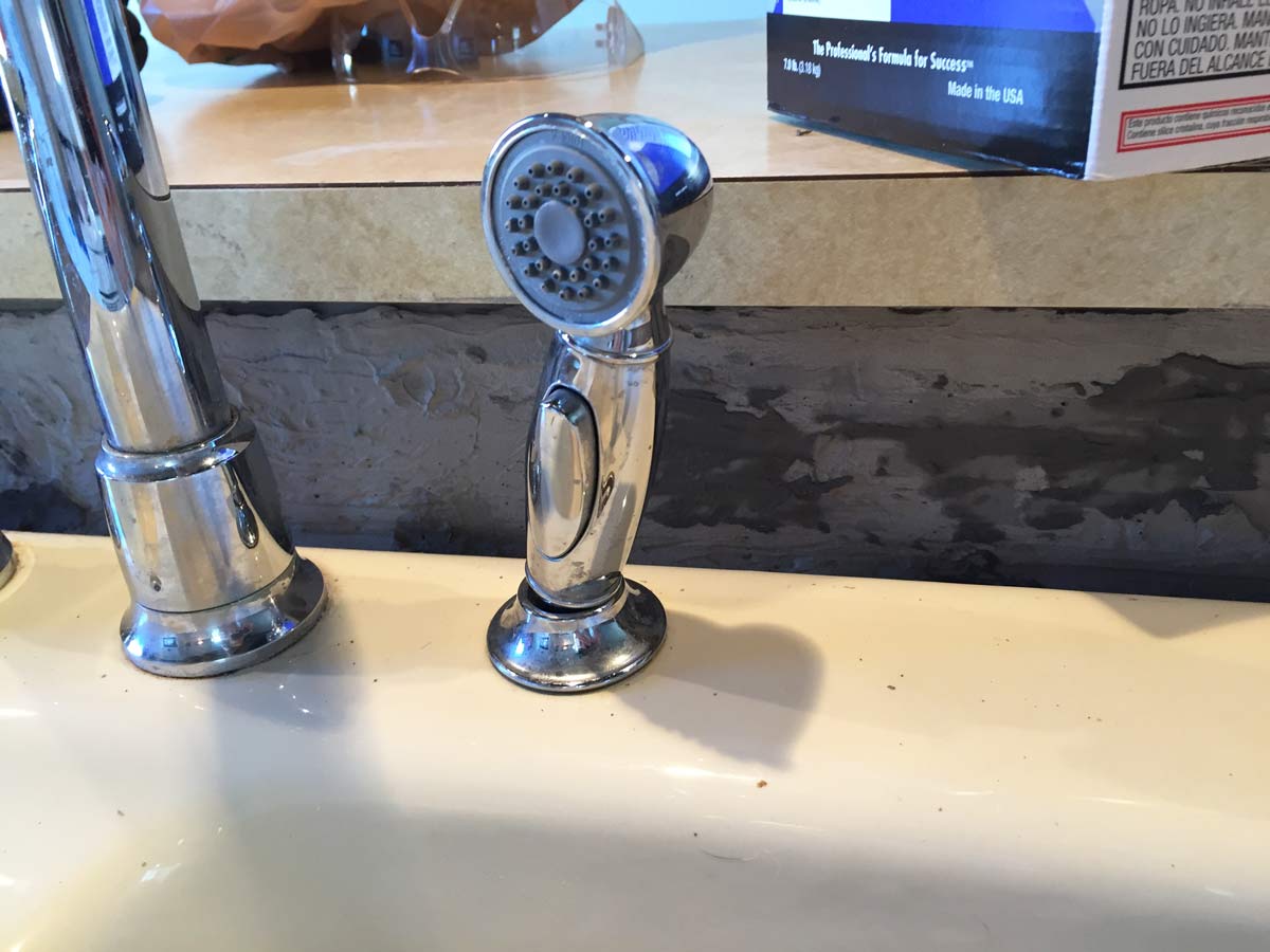 DIY feather finish concrete over tile backsplash
