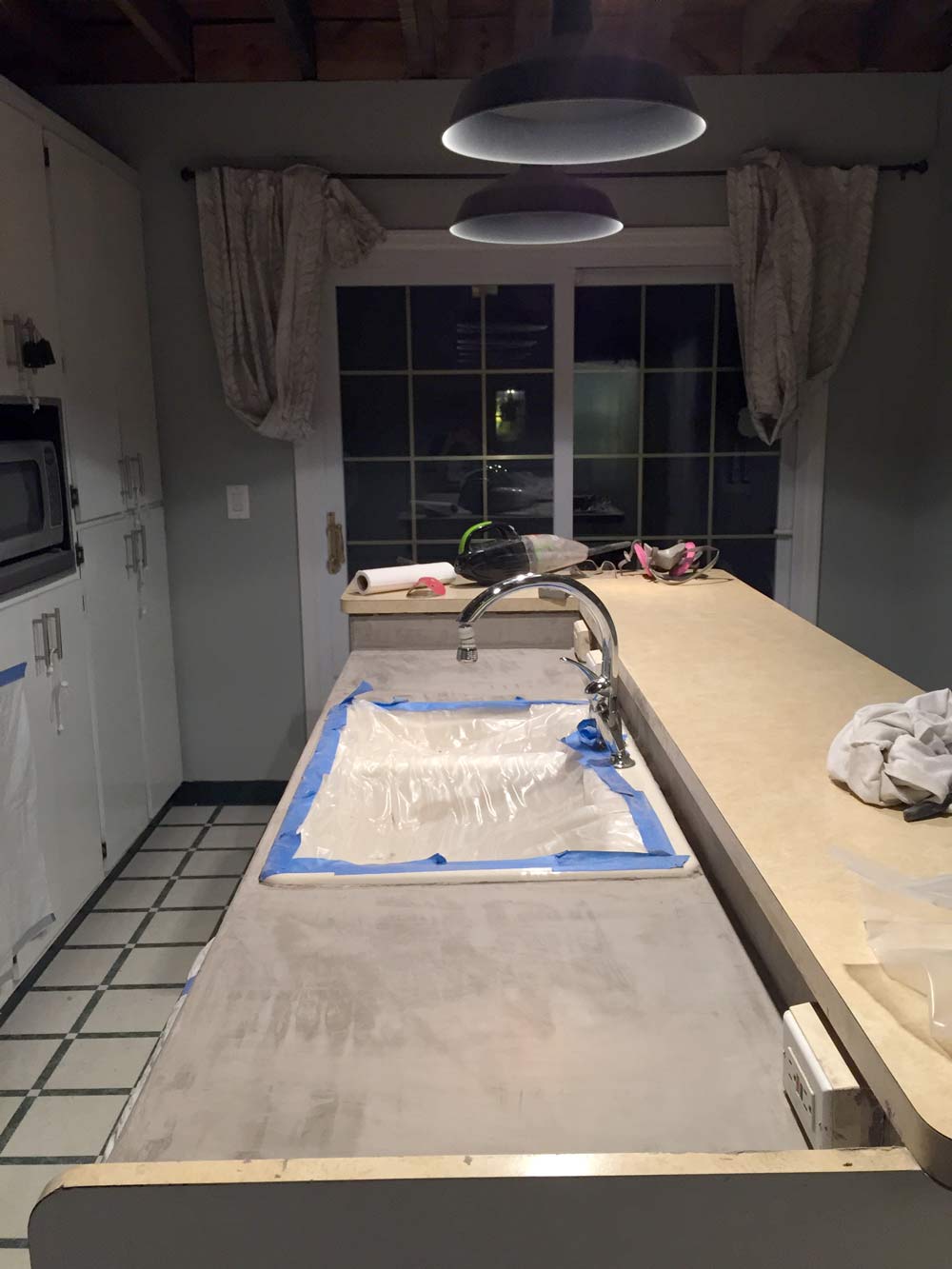 Feather Finish Concrete Over Tile Counters And Then We Tried Using An Orbital Sander For Diy Feather Finish Concrete Over Tile Counters