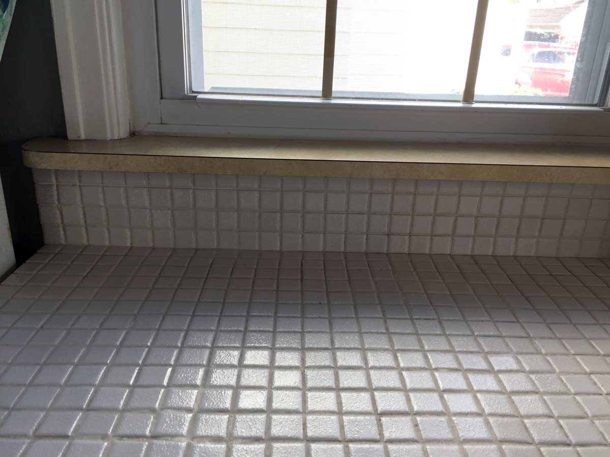 Feather Finish Concrete Over Tile Counters And Then We Tried Tile Countertops And A Backsplash As Base For Diy Feather Finish Concrete Counters